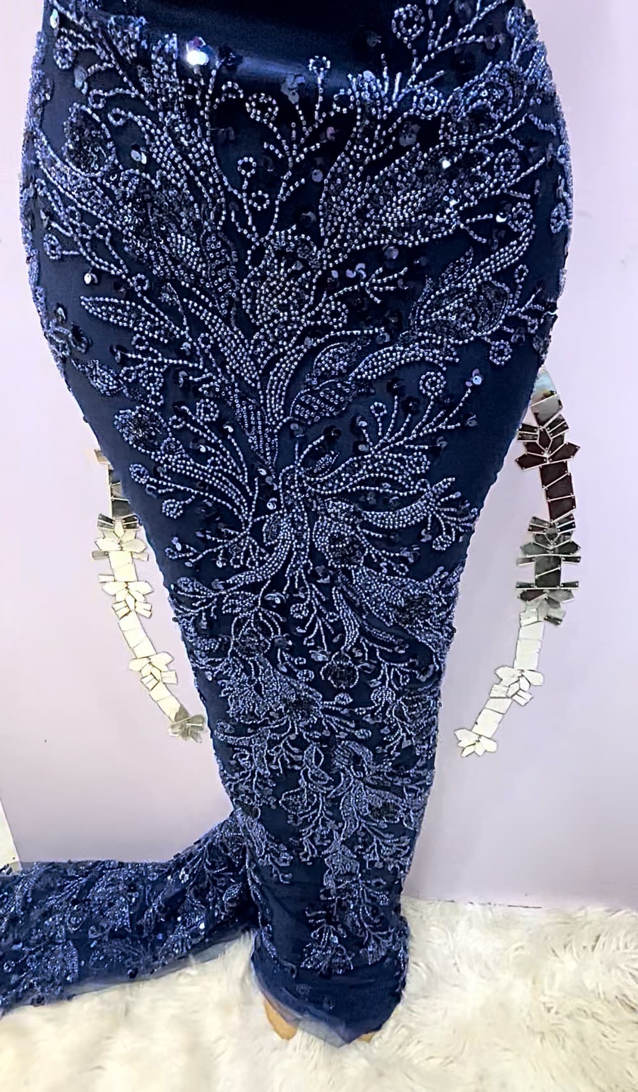 Aso Ebi outfits showing different fabrics mixed for style and elegance